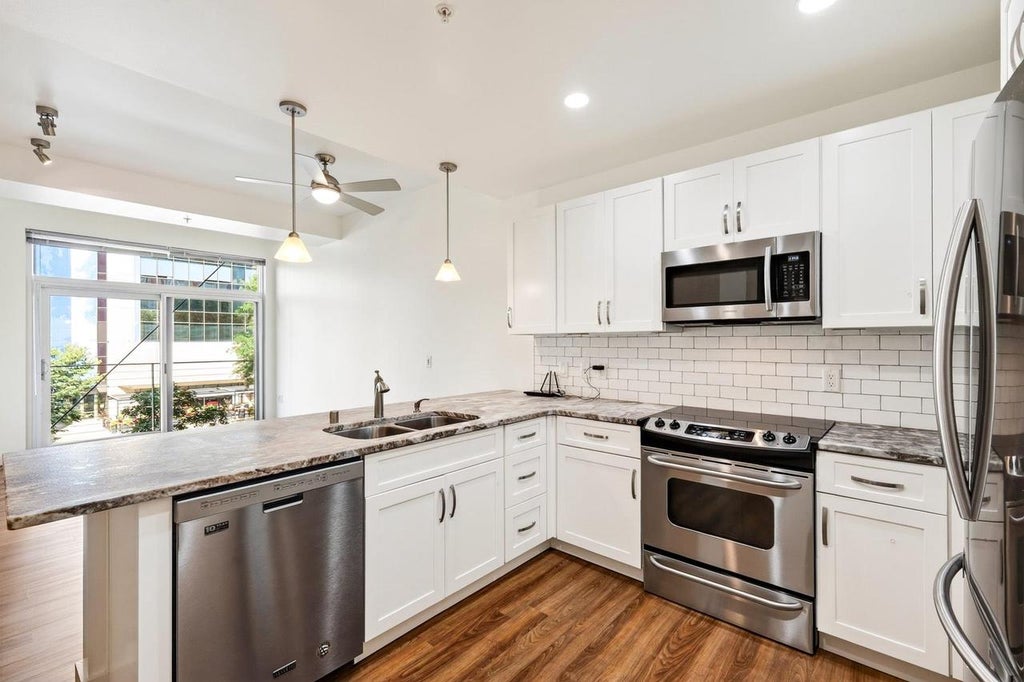 Photo of 309 W Washington AVENUE #203, Madison, WI 53703 (MLS # 2031532)