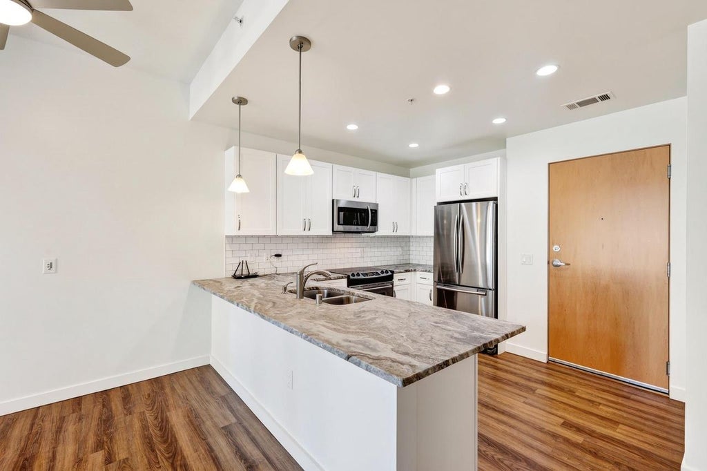 Photo of 309 W Washington AVENUE #203, Madison, WI 53703 (MLS # 2031532)