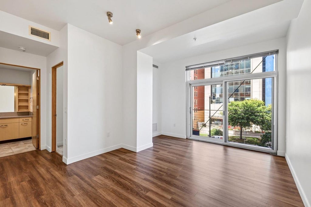 Photo of 309 W Washington AVENUE #203, Madison, WI 53703 (MLS # 2031532)