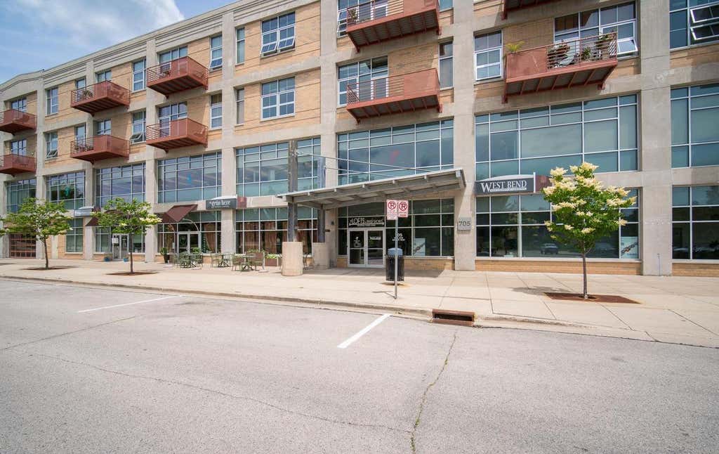 Photo of 705 Village Green WAY #311, West Bend, WI 53090 (MLS # 1967632)