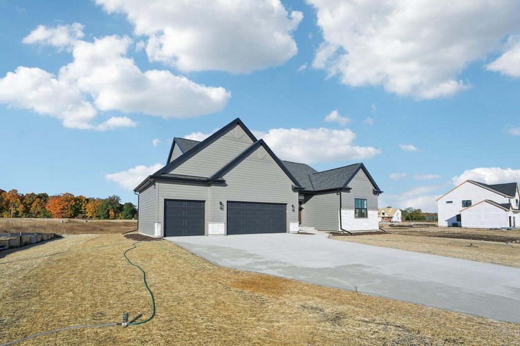 Photo of 465 Sandstone STREET, Slinger, WI 53086 (MLS # 1940082)