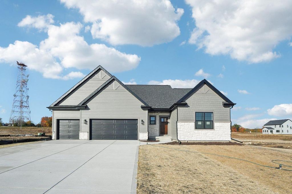 Photo of 465 Sandstone STREET, Slinger, WI 53086 (MLS # 1940082)