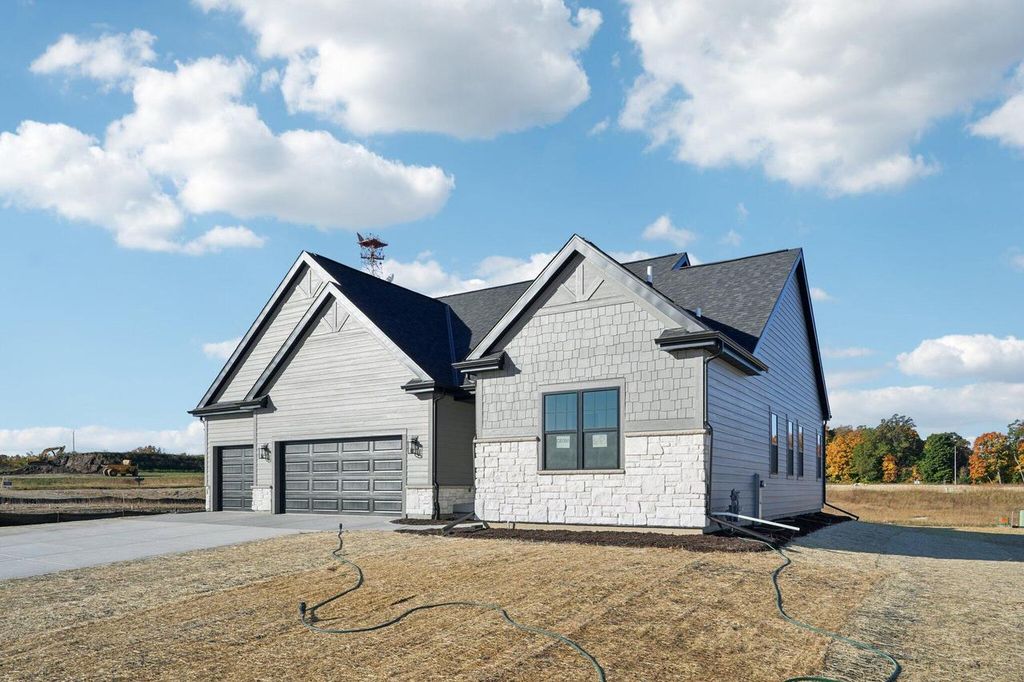 Photo of 465 Sandstone STREET, Slinger, WI 53086 (MLS # 1940082)