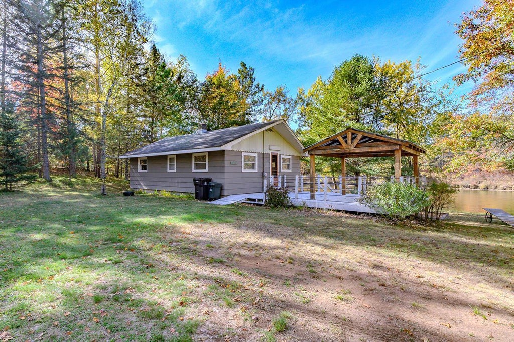 Photo of 6907 E Rapids ROAD, Lake Tomahawk, WI 54539 (MLS # 22605006)