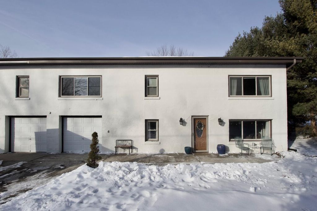 Photo of 311 S Lapham Peak ROAD, Delafield, WI 53018 (MLS # 1949835)