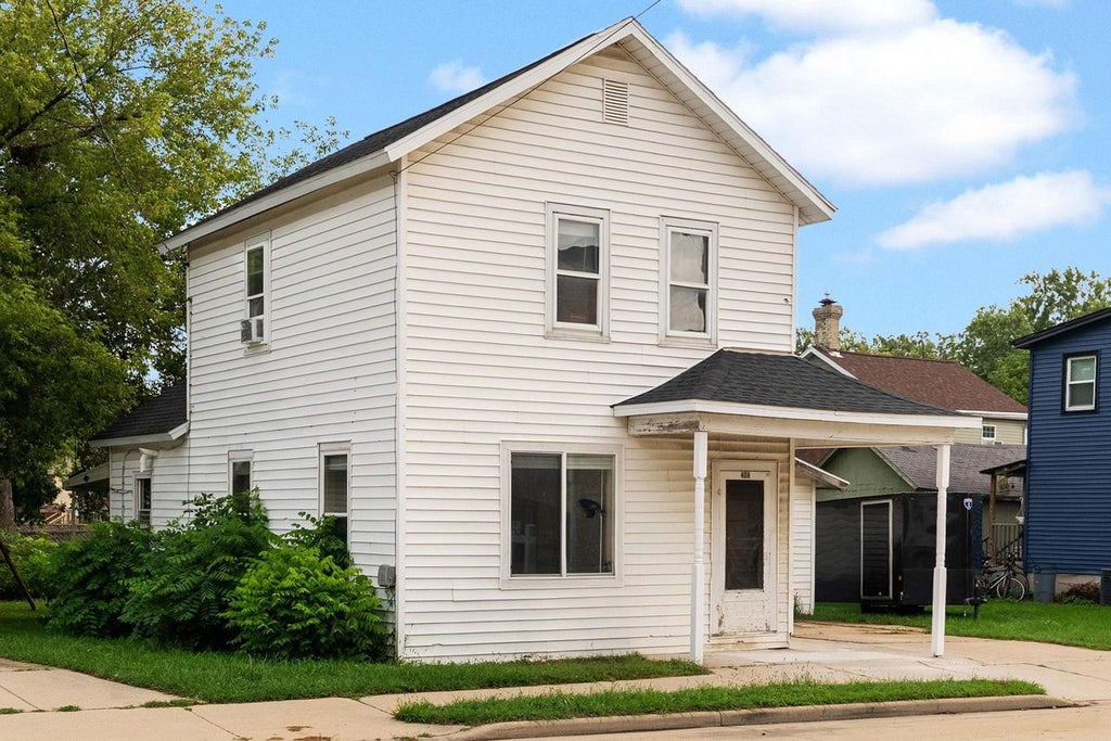 Photo of 408 W Fulton STREET, Edgerton, WI 53534 (MLS # 2029991)