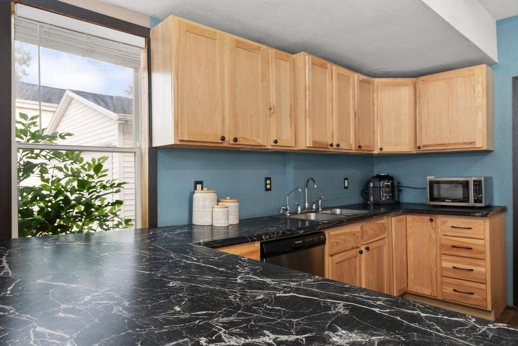 Photo of 408 W Fulton STREET, Edgerton, WI 53534 (MLS # 2029991)