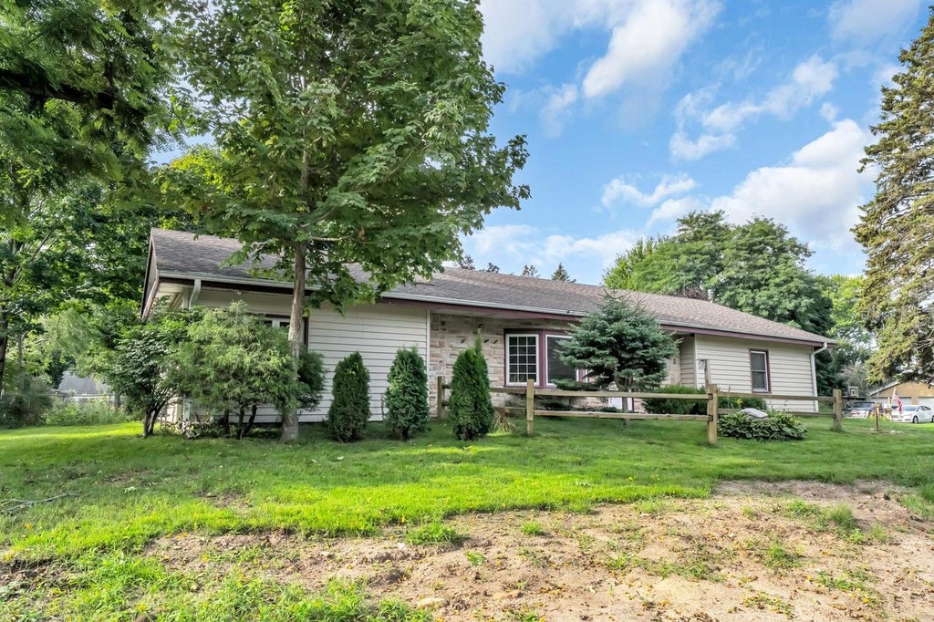 Photo of 301 E 4 Mile ROAD, Wind Point, WI 53402 (MLS # 1979777)