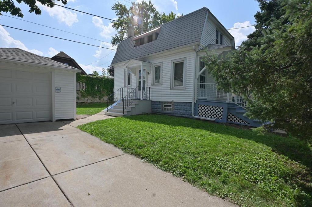 Photo of 5411 W Wells STREET W STREET W, Milwaukee, WI 53208 (MLS # 1978329)