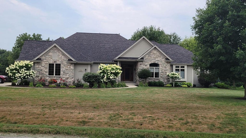 Photo of W383N8625 Blue River PASS, Oconomowoc, WI 53066 (MLS # 1975435)