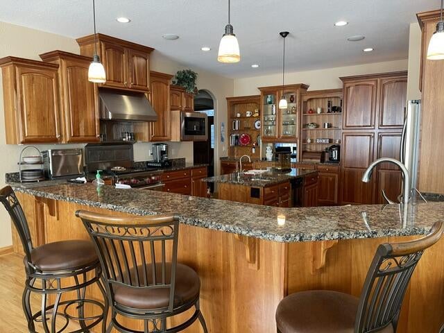 Photo of W383N8625 Blue River PASS, Oconomowoc, WI 53066 (MLS # 1975435)