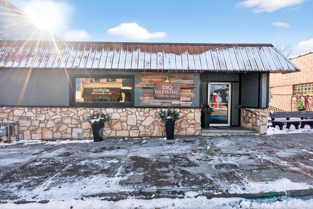 Photo of 115 W Wisconsin AVENUE, Kaukauna, WI 54130 (MLS # 50318949)