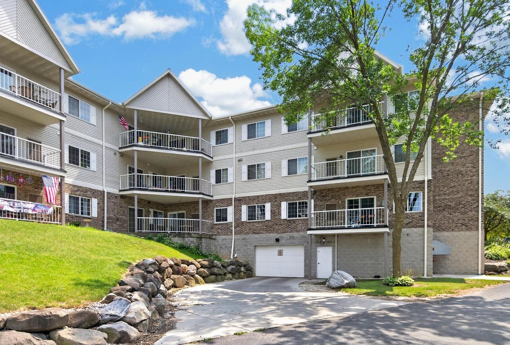 Photo of 140 W Commerce BOULEVARD #311, Slinger, WI 53086 (MLS # 1979978)