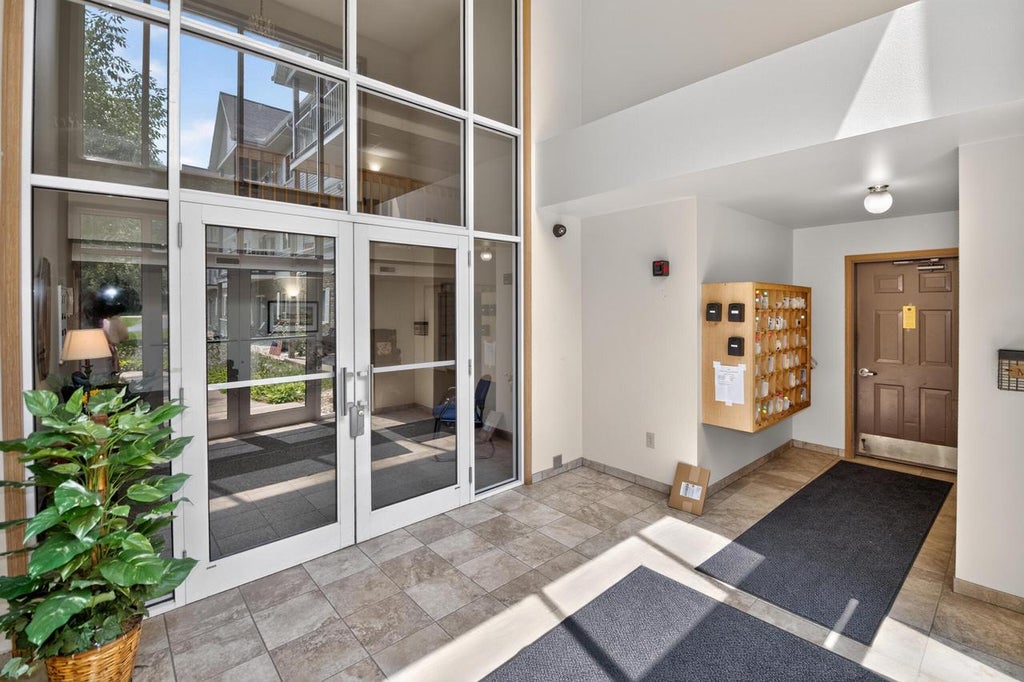 Photo of 140 W Commerce BOULEVARD #311, Slinger, WI 53086 (MLS # 1979978)