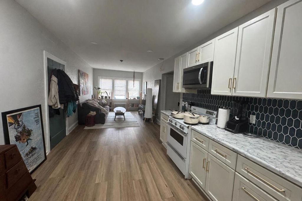 Photo of 1027 E Center STREET, Milwaukee, WI 53212 (MLS # 1955107)