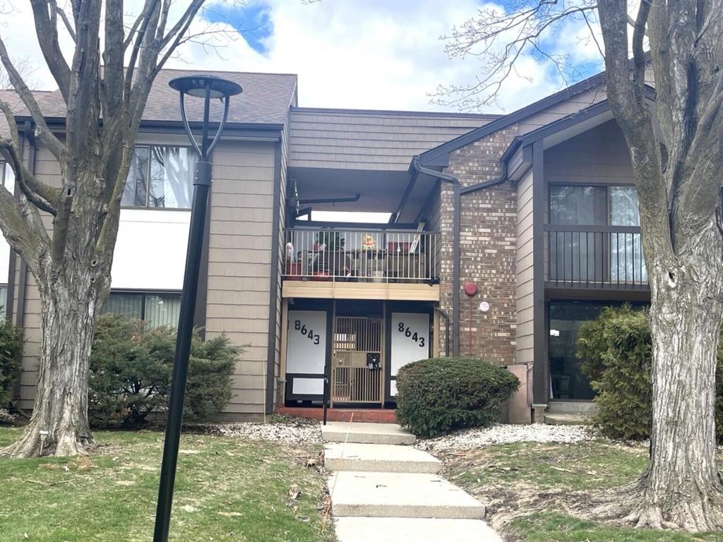 Photo of 8643 N Servite DRIVE #214, Milwaukee, WI 53223 (MLS # 1955628)