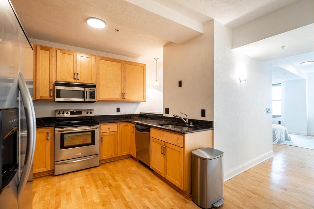 Photo of 606 W Wisconsin AVENUE #501, Milwaukee, WI 53203 (MLS # 1977199)