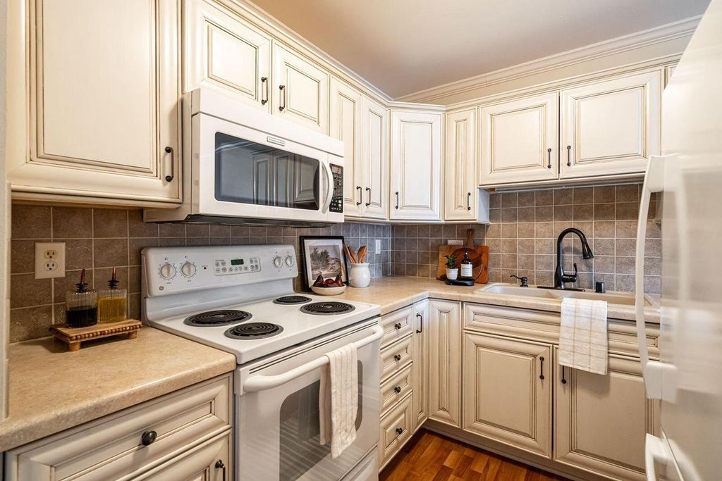 Photo of 11936 W Mill ROAD #9, Milwaukee, WI 53225 (MLS # 1953247)