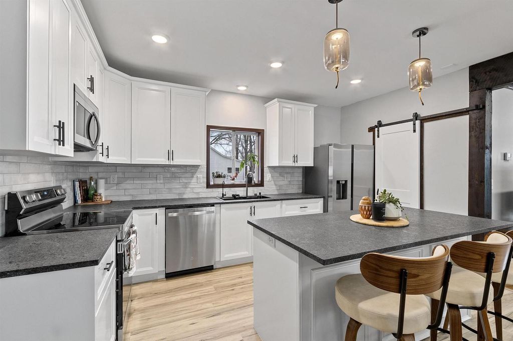 Photo of 418 Smith AVENUE, Oconto, WI 54153 (MLS # 50322732)