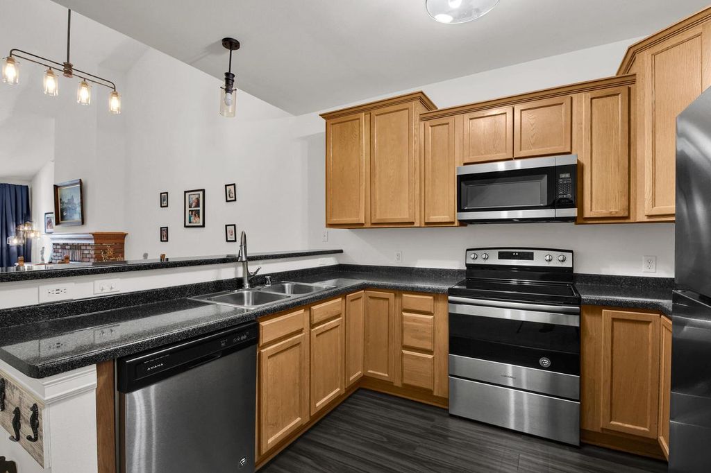 Photo of 2030 Rainbow Lake LANE #323, West Bend, WI 53090 (MLS # 1947975)