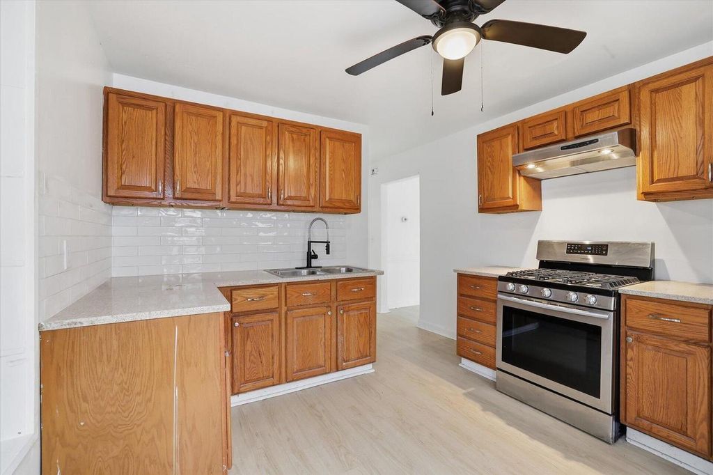 Photo of 645 S 60th STREET, Milwaukee, WI 53214 (MLS # 1944075)