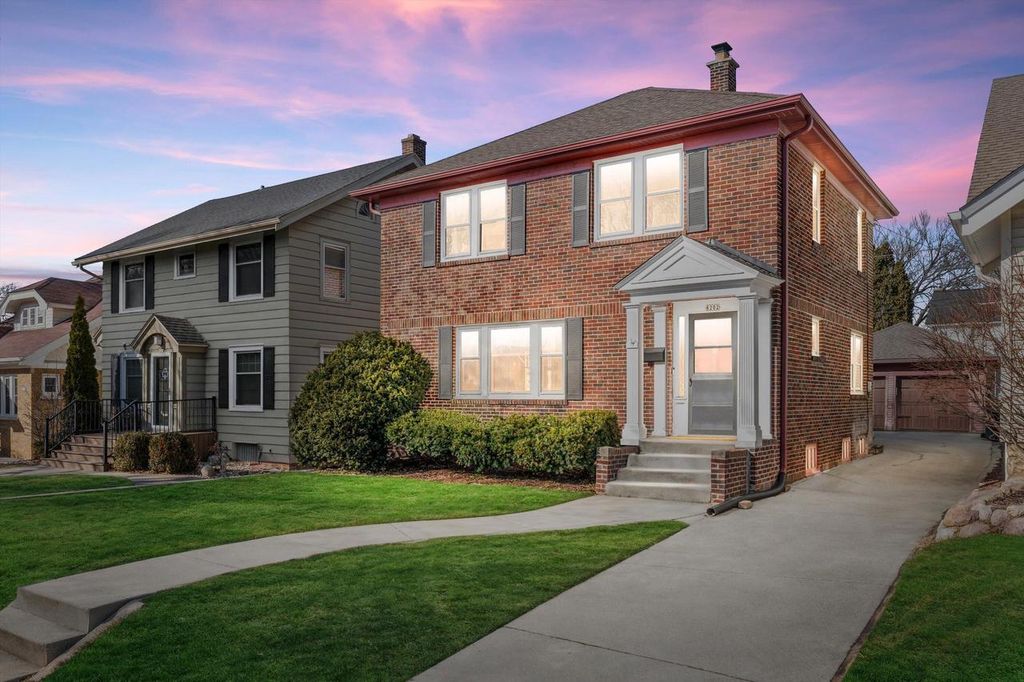 Photo of 8202 W Woodland AVENUE, Wauwatosa, WI 53213 (MLS # 1952058)