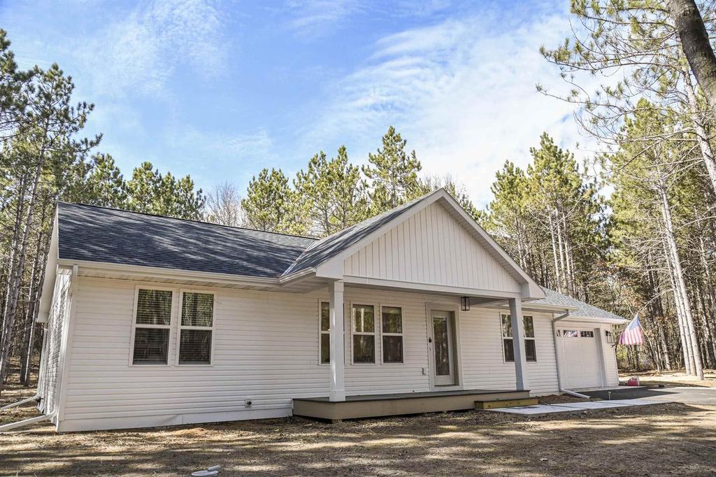 Photo of W3090 Yellow Banks TRAIL, Nekoosa, WI 54457 (MLS # 2023762)