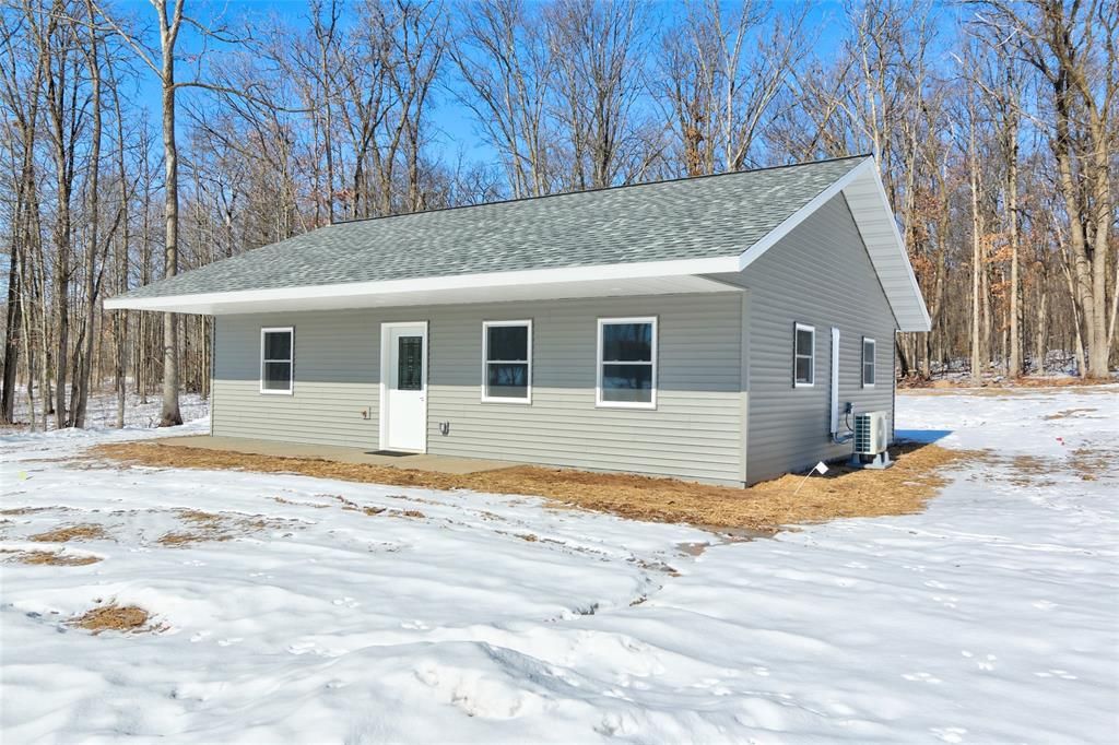Photo of 1520 Woodland STREET, Spooner, WI 54801 (MLS # 1599247)