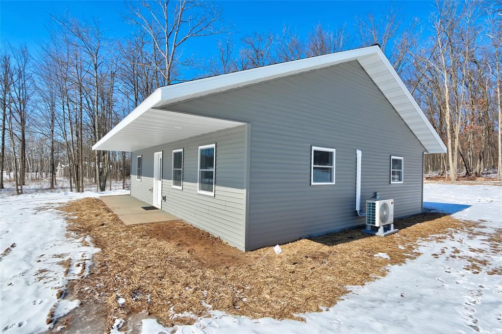 Photo of 1520 Woodland STREET, Spooner, WI 54801 (MLS # 1599247)