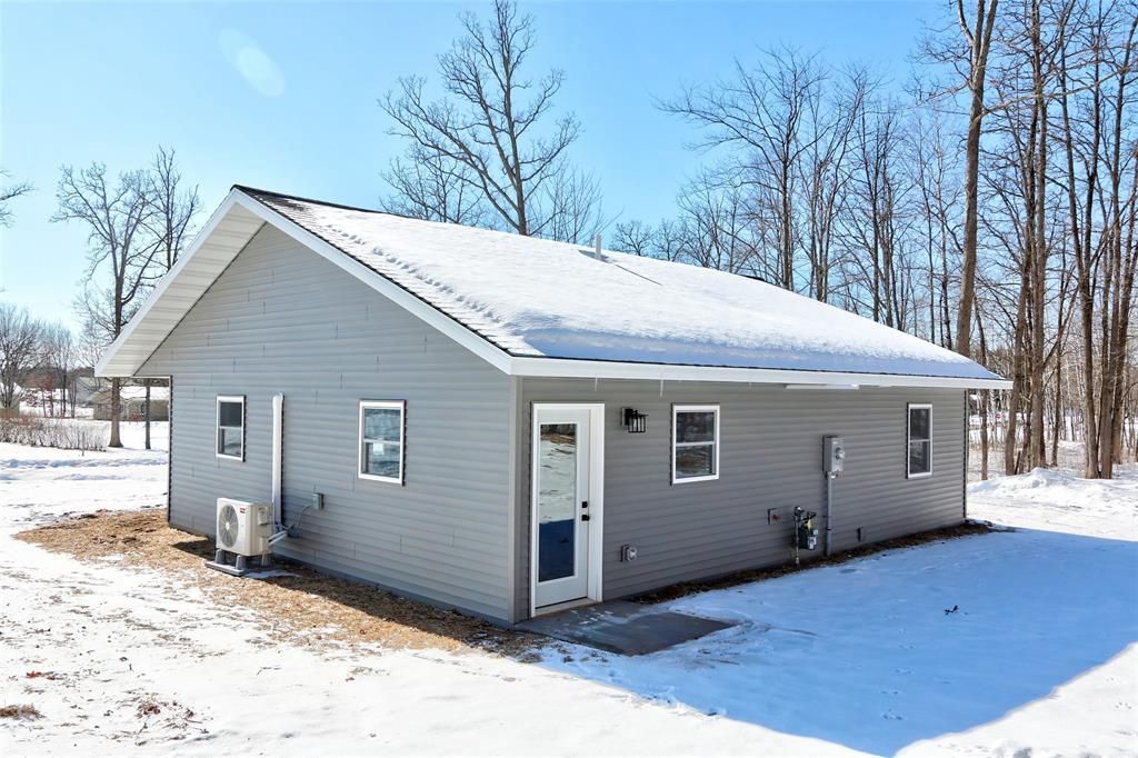 Photo of 1520 Woodland STREET, Spooner, WI 54801 (MLS # 1599247)