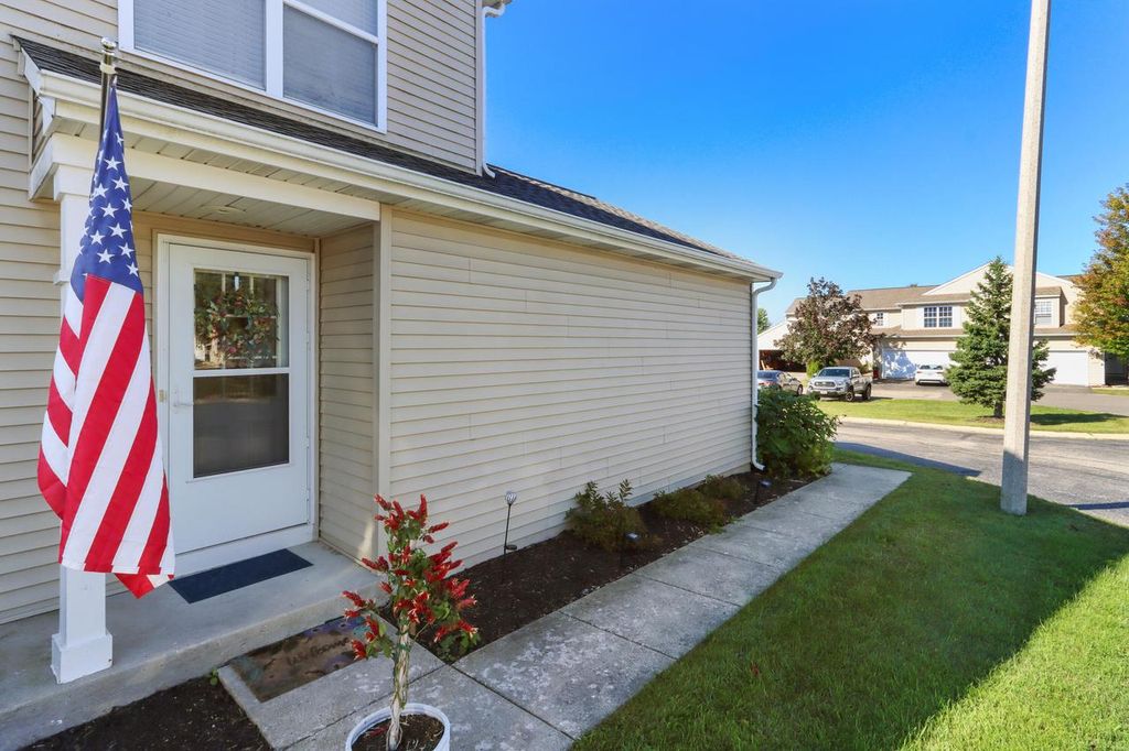 Photo of 1400 Hunters Ridge DRIVE #20, Genoa City, WI 53128 (MLS # 1938354)