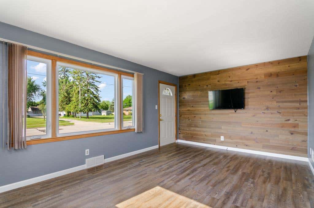 Photo of 335 E Cedar STREET, Pulaski, WI 54162 (MLS # 50328908)