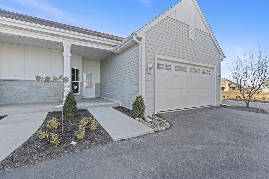 Photo of 1383 Prairie Creek CIRCLE #16E, Oconomowoc, WI 53066 (MLS # 1982724)