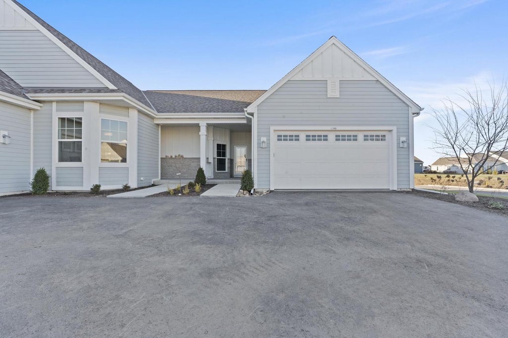 Photo of 1383 Prairie Creek CIRCLE #16E, Oconomowoc, WI 53066 (MLS # 1982724)