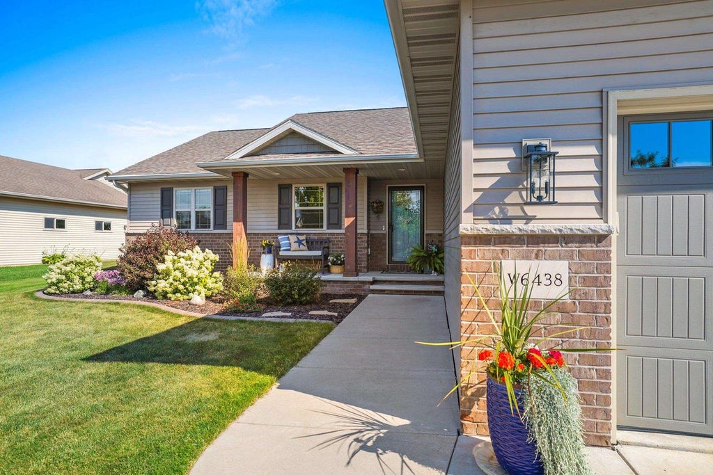 Photo of W6438 Sawtooth STREET, Menasha, WI 54952 (MLS # 50331371)