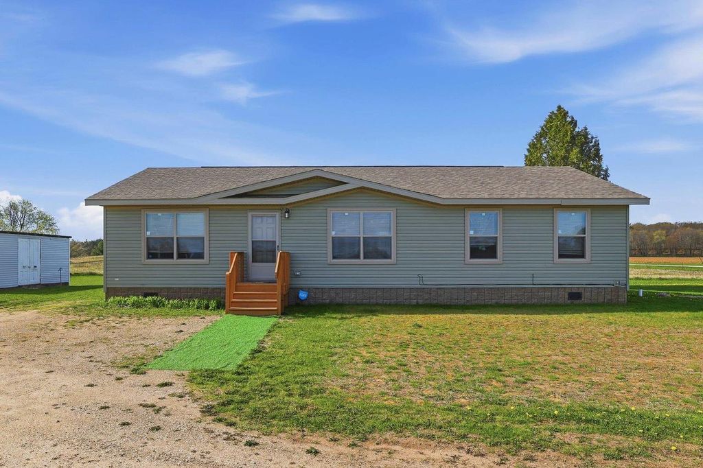 Photo of E2902 Wasrud ROAD, Iola, WI 54945 (MLS # 22601864)