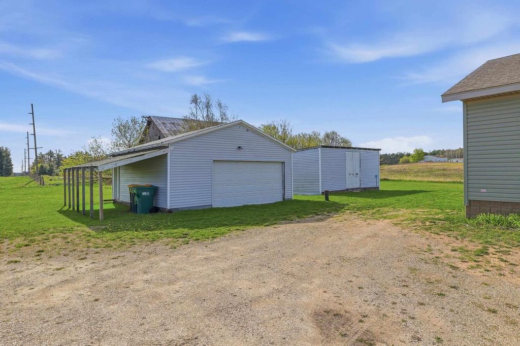 Photo of E2902 Wasrud ROAD, Iola, WI 54945 (MLS # 22601864)