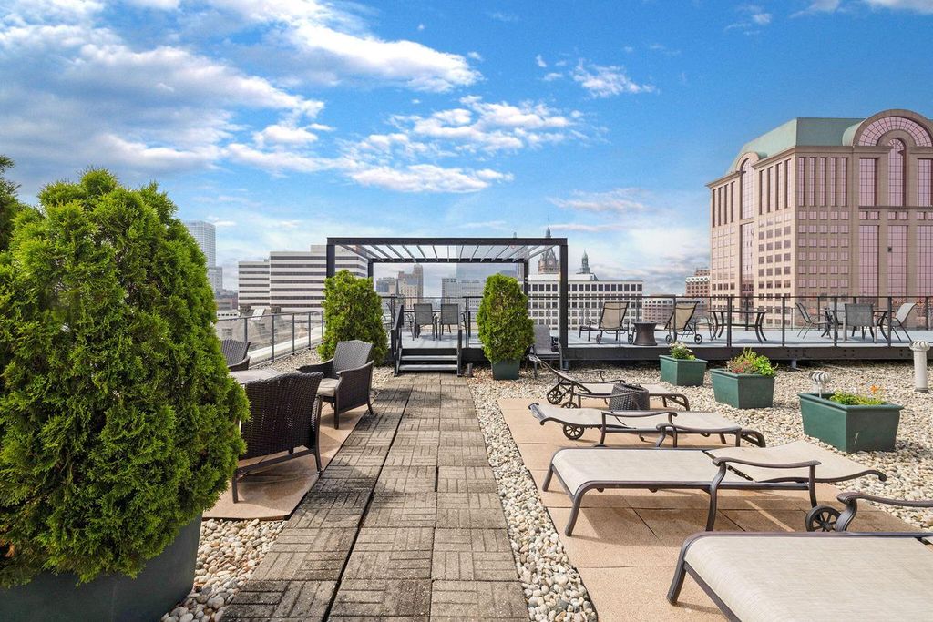 Photo of 270 E Highland AVENUE #437, Milwaukee, WI 53202 (MLS # 1947555)