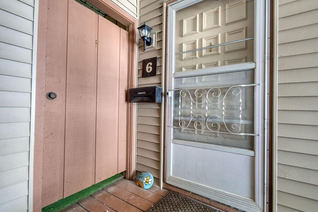 Photo of 11910 W Mill ROAD #APT 6, Milwaukee, WI 53225 (MLS # 1937272)