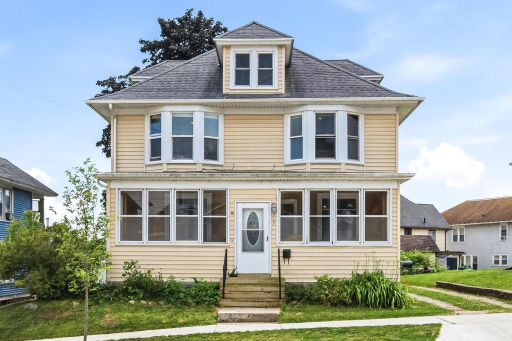 Photo of 313 Front STREET, Beaver Dam, WI 53916 (MLS # 2027920)