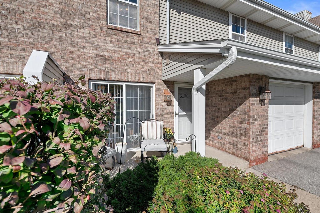 Photo of 617 Westfield WAY #C, Pewaukee, WI 53072 (MLS # 1983813)