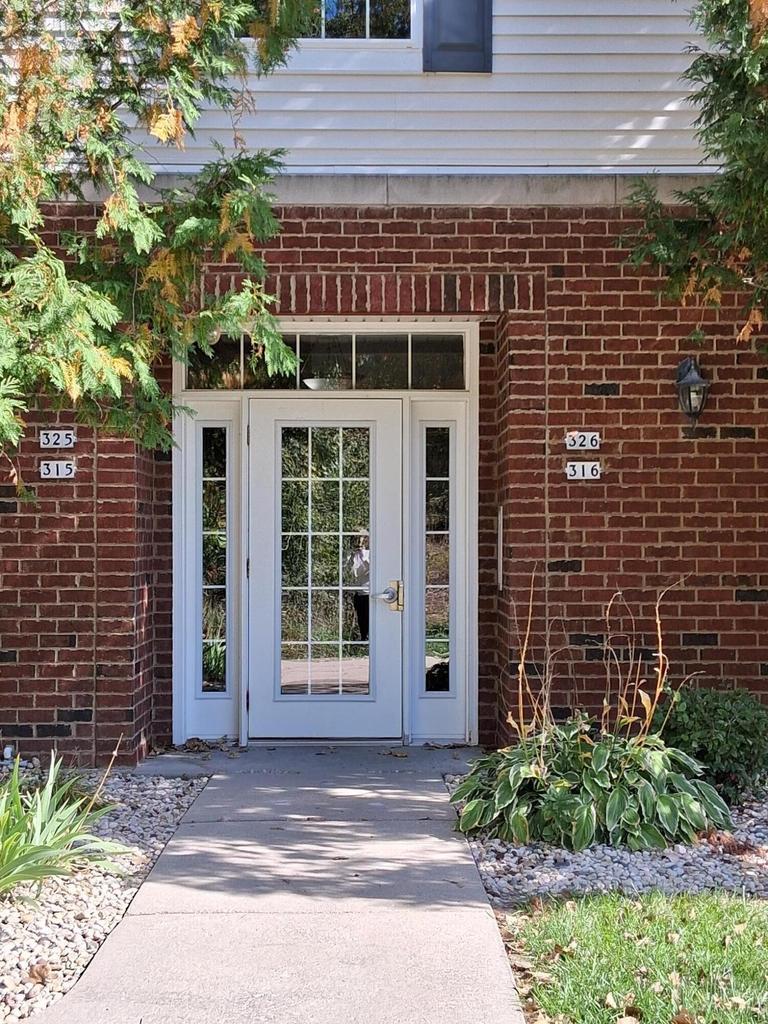 Photo of 2030 Rainbow Lake LANE #316, West Bend, WI 53090 (MLS # 1981796)