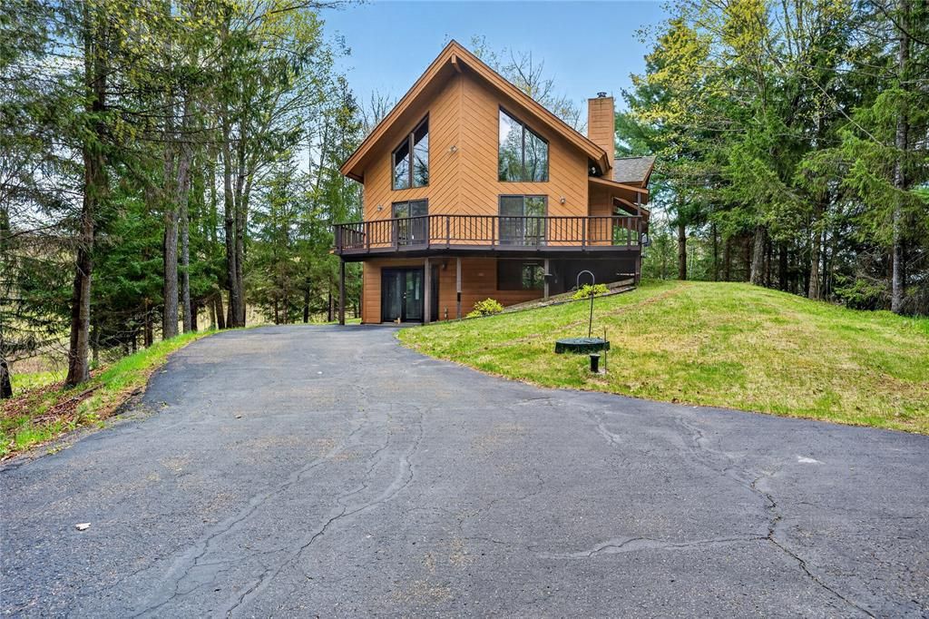 Photo of N576 Big Kegama ROAD, Sarona, WI 54870 (MLS # 1601119)