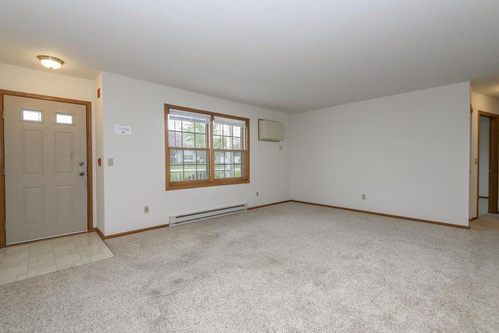 Photo of 214 Minz Park CIRCLE #1, West Bend, WI 53095 (MLS # 1961201)