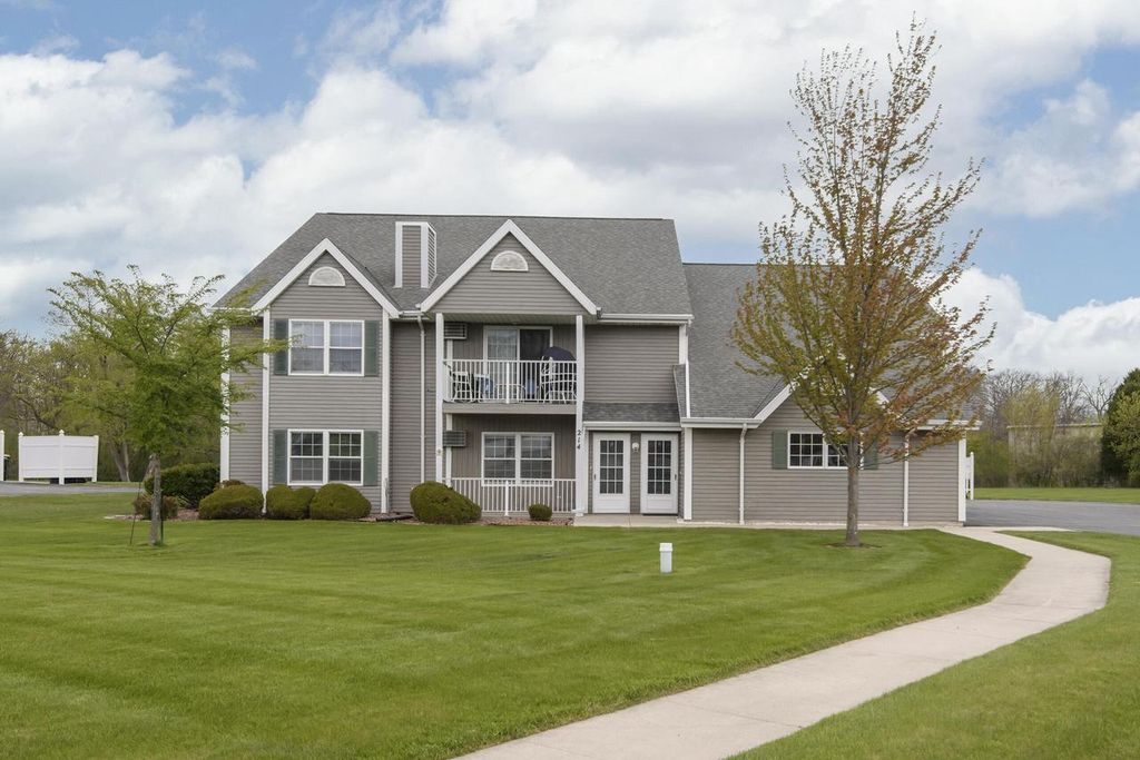 Photo of 214 Minz Park CIRCLE #1, West Bend, WI 53095 (MLS # 1961201)