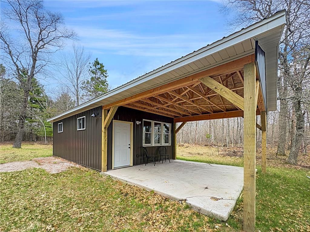 Photo of 26792 Ice House Bridge ROAD, Webster, WI 54893 (MLS # 7066105)