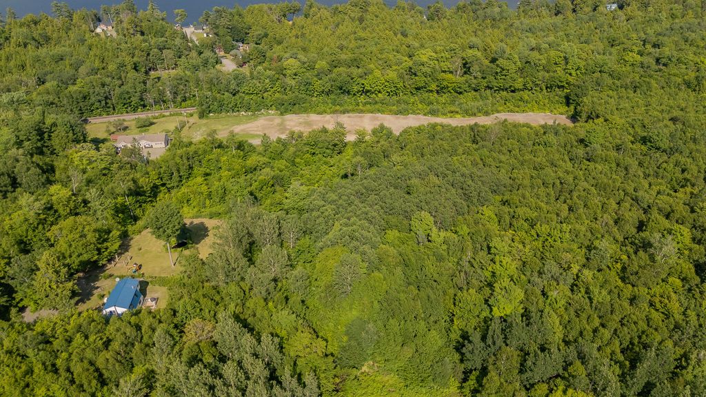 Photo of Map6L9-A34 Russell Road, Brownville, ME 04414 (MLS # 1648758)