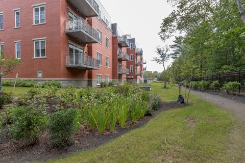 Photo of 75 McAuley Way #203, Portland, ME 04103 (MLS # 1615403)