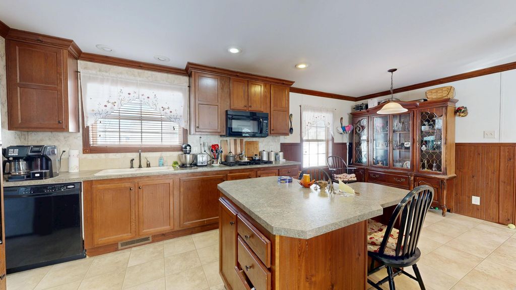 Photo of 8 Sheldon Place, Lewiston, ME 04240 (MLS # 1648752)