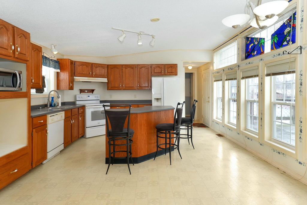 Photo of 22 Robbins Avenue, Dixfield, ME 04224 (MLS # 1617169)